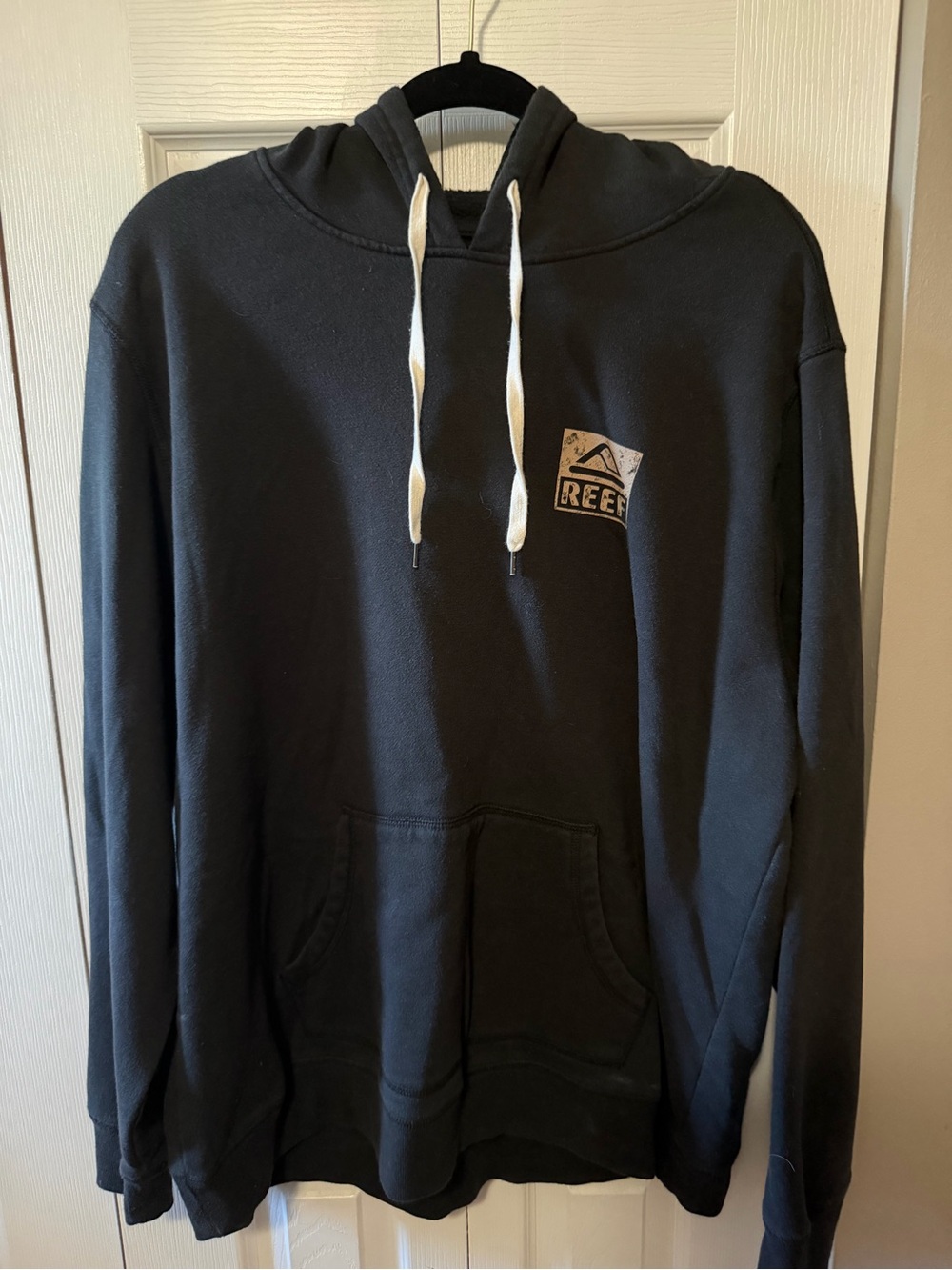 Reef Black Pullover Hoodie with White Drawstrings